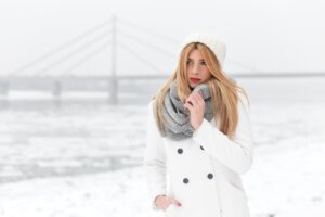 Winter Portrait Of Beautiful Blonde Young Woman.